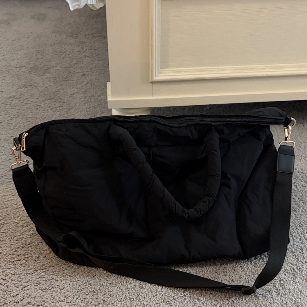 a new day Black Travel Bag